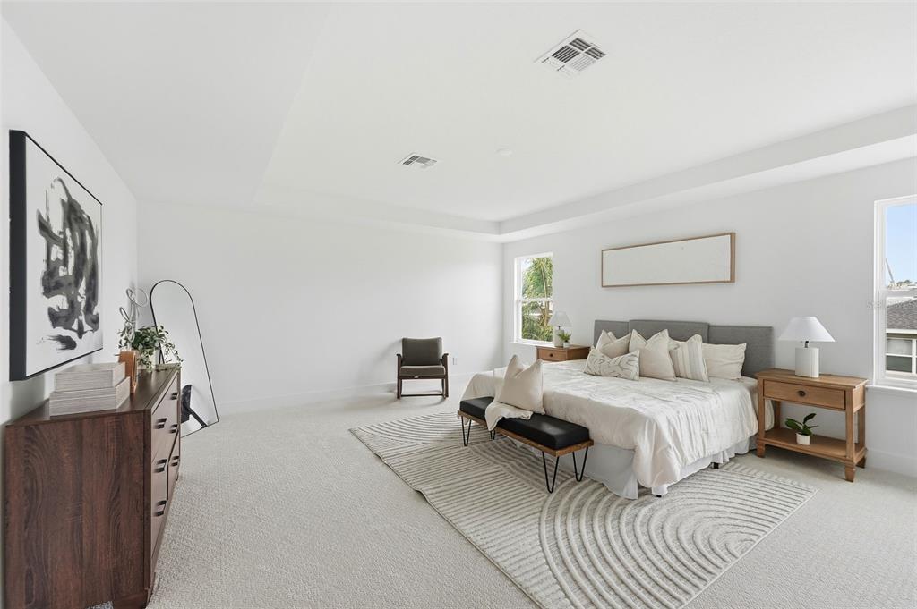 2430 Park Ridge Street Apopka, FL 32712 - Photo 19 of 49 a bedroom with a bed a couch and dresser