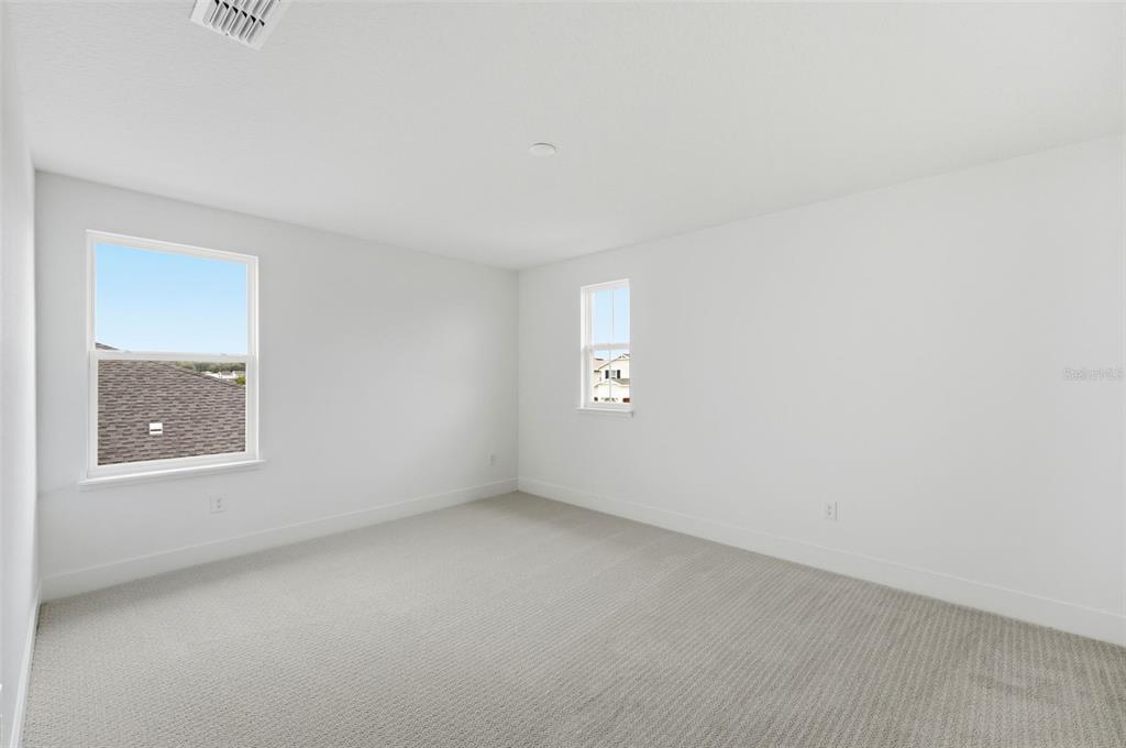 2430 Park Ridge Street Apopka, FL 32712 - Photo 25 of 49 an empty room with a window