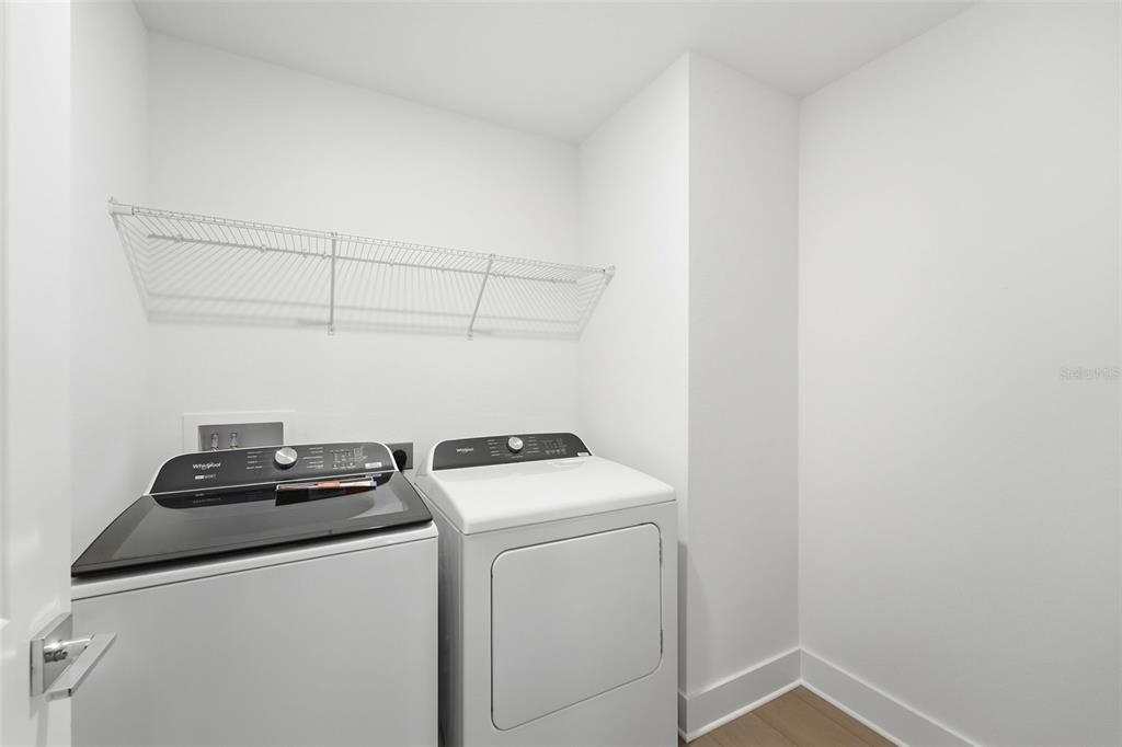 2430 Park Ridge Street Apopka, FL 32712 - Photo 29 of 49 a utility room with dryer and washer