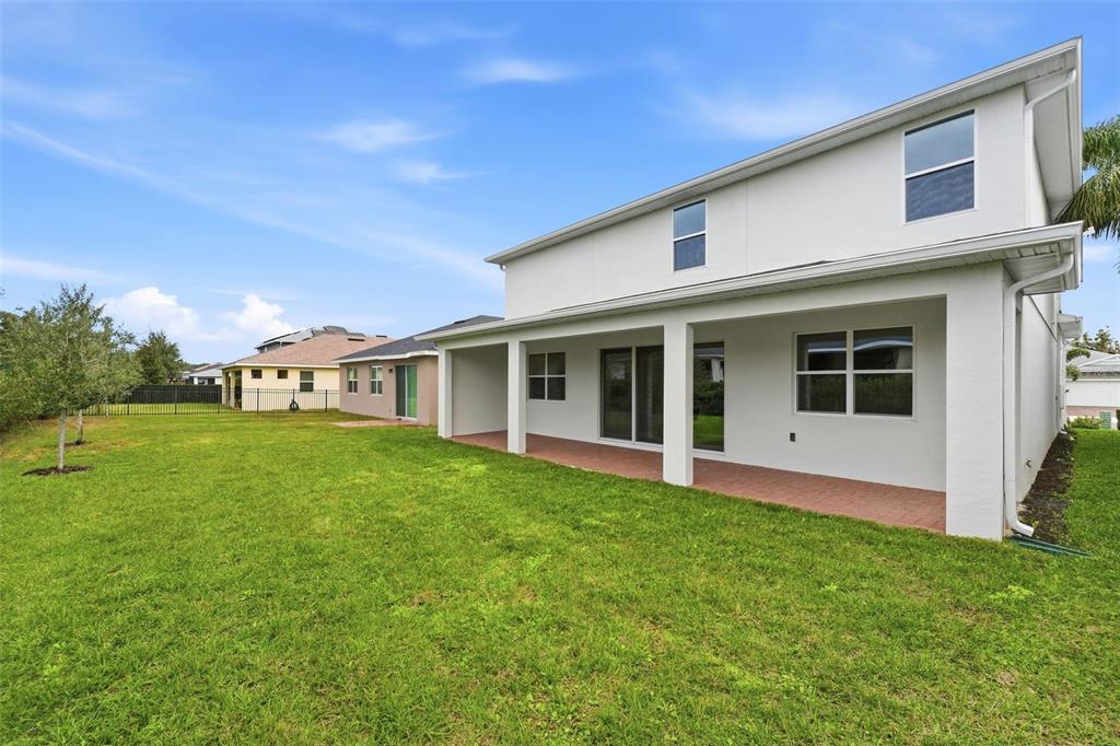 2430 Park Ridge Street Apopka, FL 32712 - Photo 30 of 49 a view of a house with a yard and sitting area