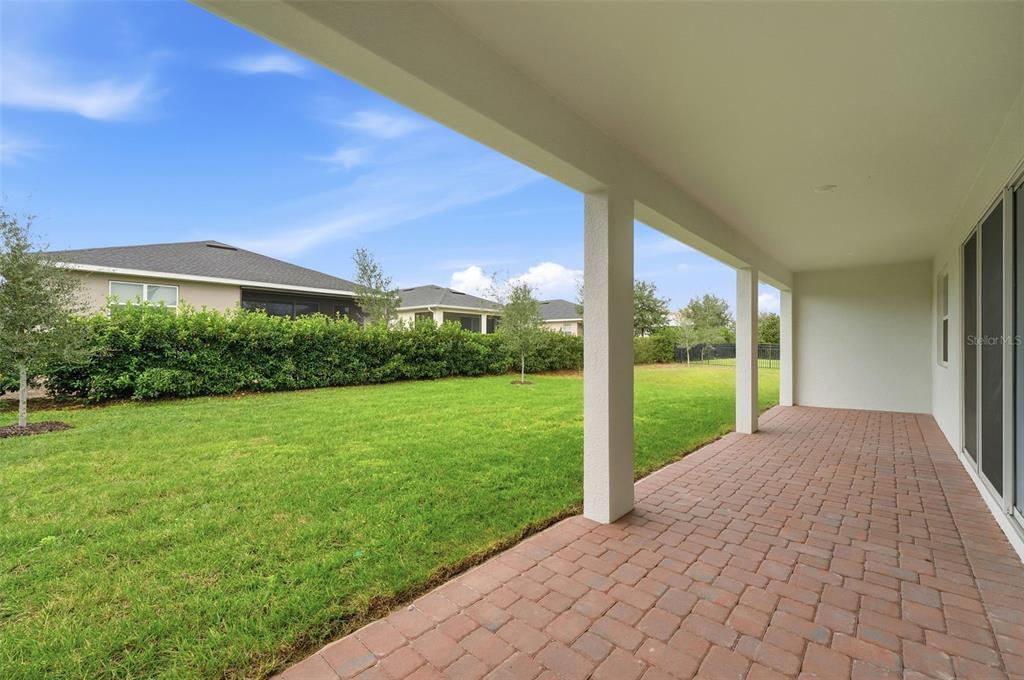 2430 Park Ridge Street Apopka, FL 32712 - Photo 31 of 49 a view of a yard with an outdoor seating