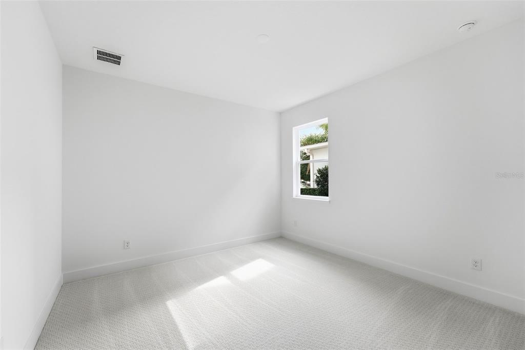 2430 Park Ridge Street Apopka, FL 32712 - Photo 6 of 49 a view of an empty room with a window