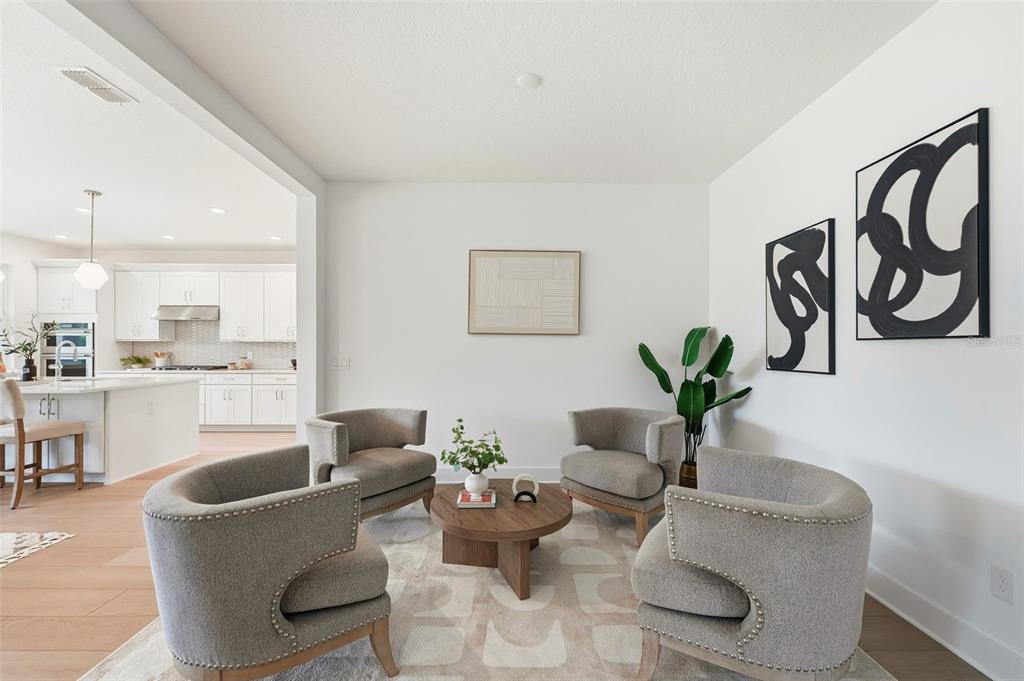 2430 Park Ridge Street Apopka, FL 32712 - Photo 9 of 49 a living room with furniture and flowers