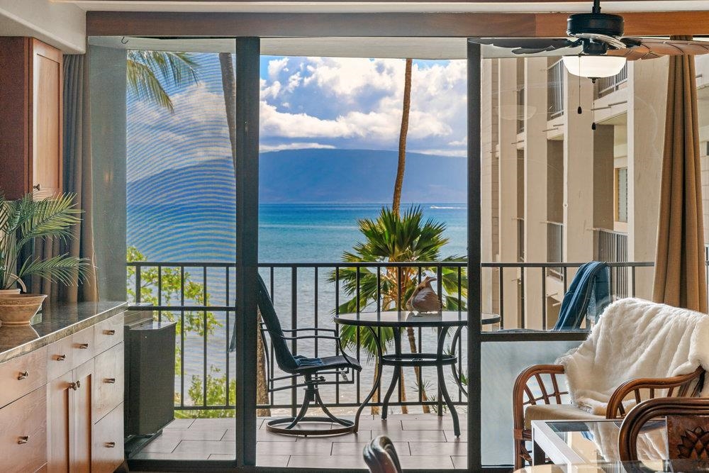 4327 Lower Honoapiilani Road, Unit 403 Lahaina, HI 96761 - Photo 12 of 42 a view of a dining room with furniture window and outside view