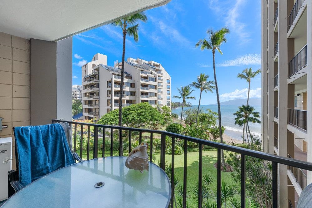 4327 Lower Honoapiilani Road, Unit 403 Lahaina, HI 96761 - Photo 13 of 42 a view of a balcony with potted plants