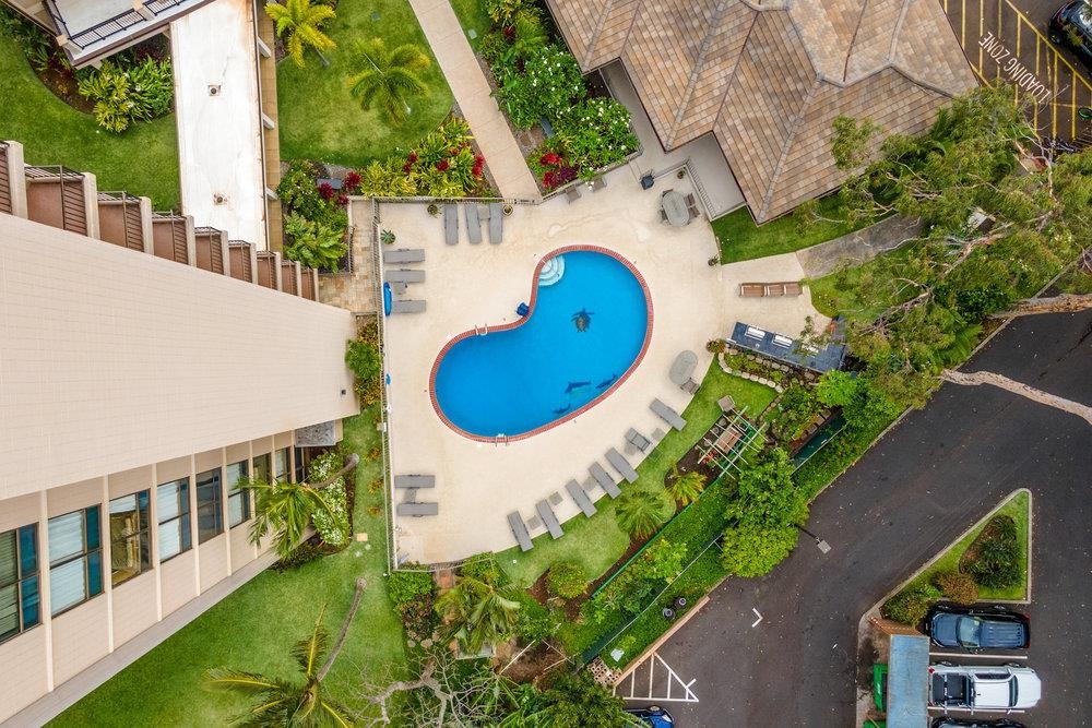 4327 Lower Honoapiilani Road, Unit 403 Lahaina, HI 96761 - Photo 27 of 42 an aerial view of a house with a swimming pool