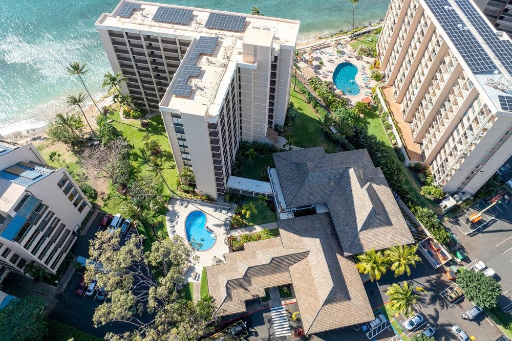 4327 Lower Honoapiilani Road, Unit 403 Lahaina, HI 96761 - Photo 37 of 42 aerial view of multiple houses with yard