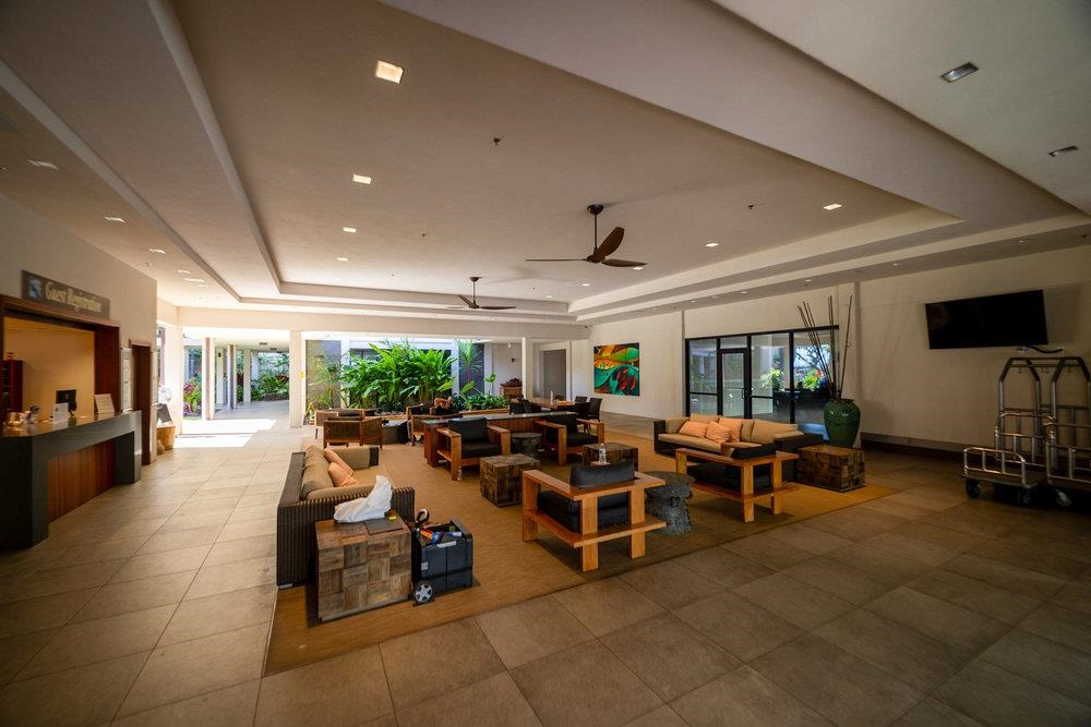 4327 Lower Honoapiilani Road, Unit 403 Lahaina, HI 96761 - Photo 40 of 42 a living room with furniture large window and flat screen tv