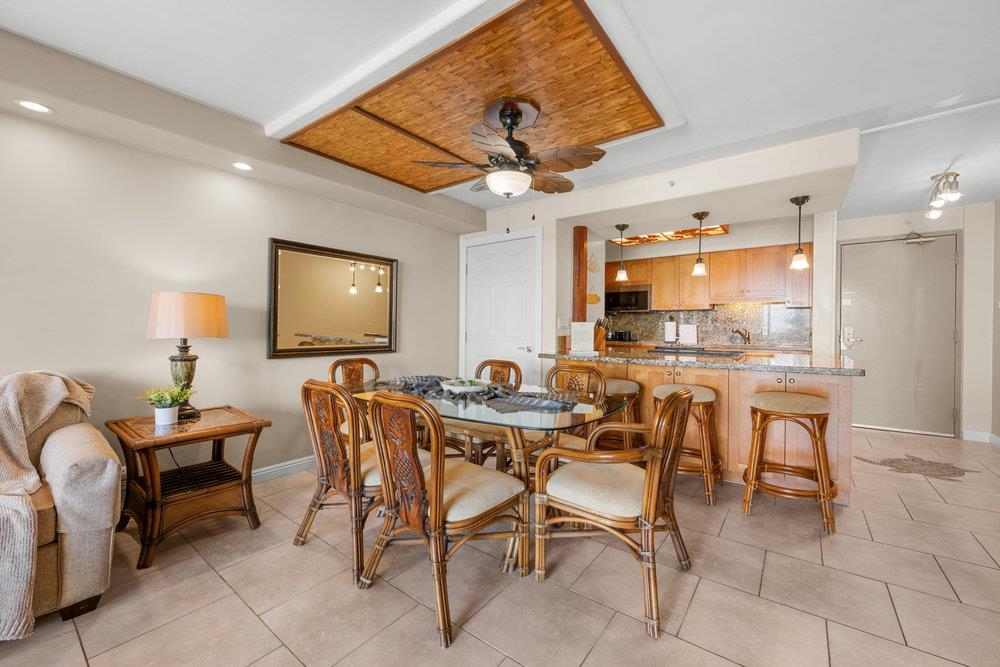 4327 Lower Honoapiilani Road, Unit 403 Lahaina, HI 96761 - Photo 6 of 42 a view of a dining room with furniture