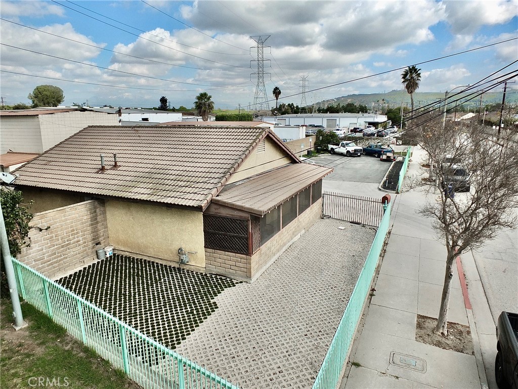 9357 Kruse Road Pico Rivera, CA 90660 - Photo 7 of 11 a view of a house with a wooden deck