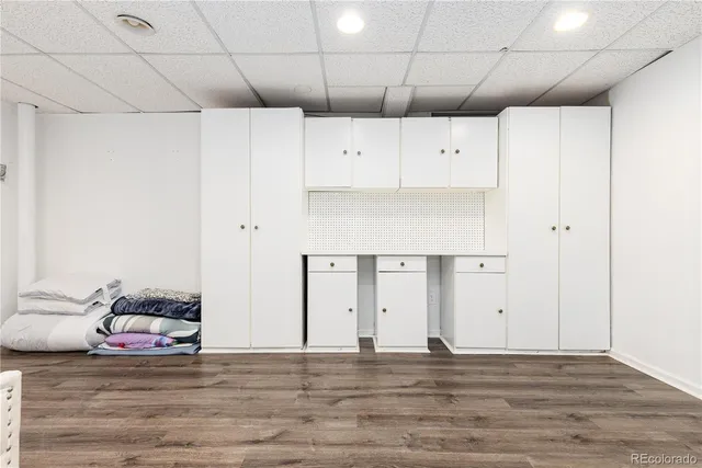 a view of a livingroom with wooden floor
