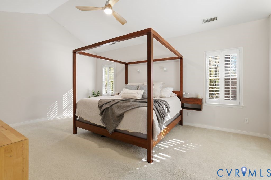 5600 Houndmaster Road Midlothian, VA 23112 - Photo 23 of 46 a bedroom with a bed window and a ceiling fan