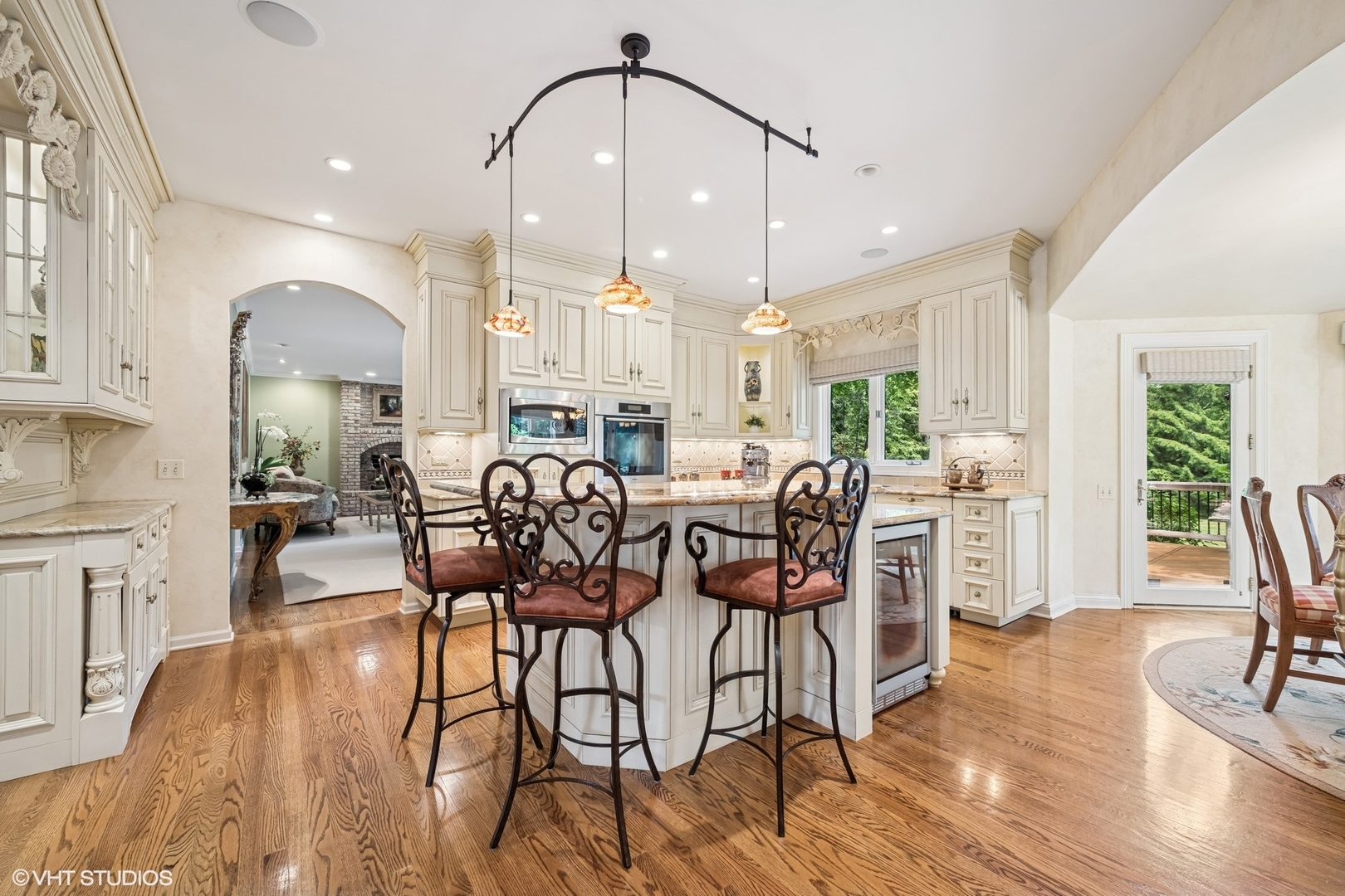 85 Ela Road Inverness, IL 60067 - Photo 15 of 89 a view of a a dining room with furniture window and wooden floor