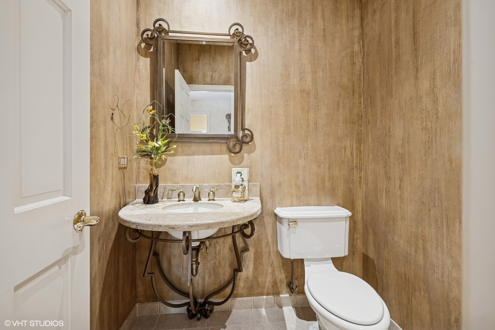 85 Ela Road Inverness, IL 60067 - Photo 23 of 89 a bathroom with a toilet a sink and a mirror