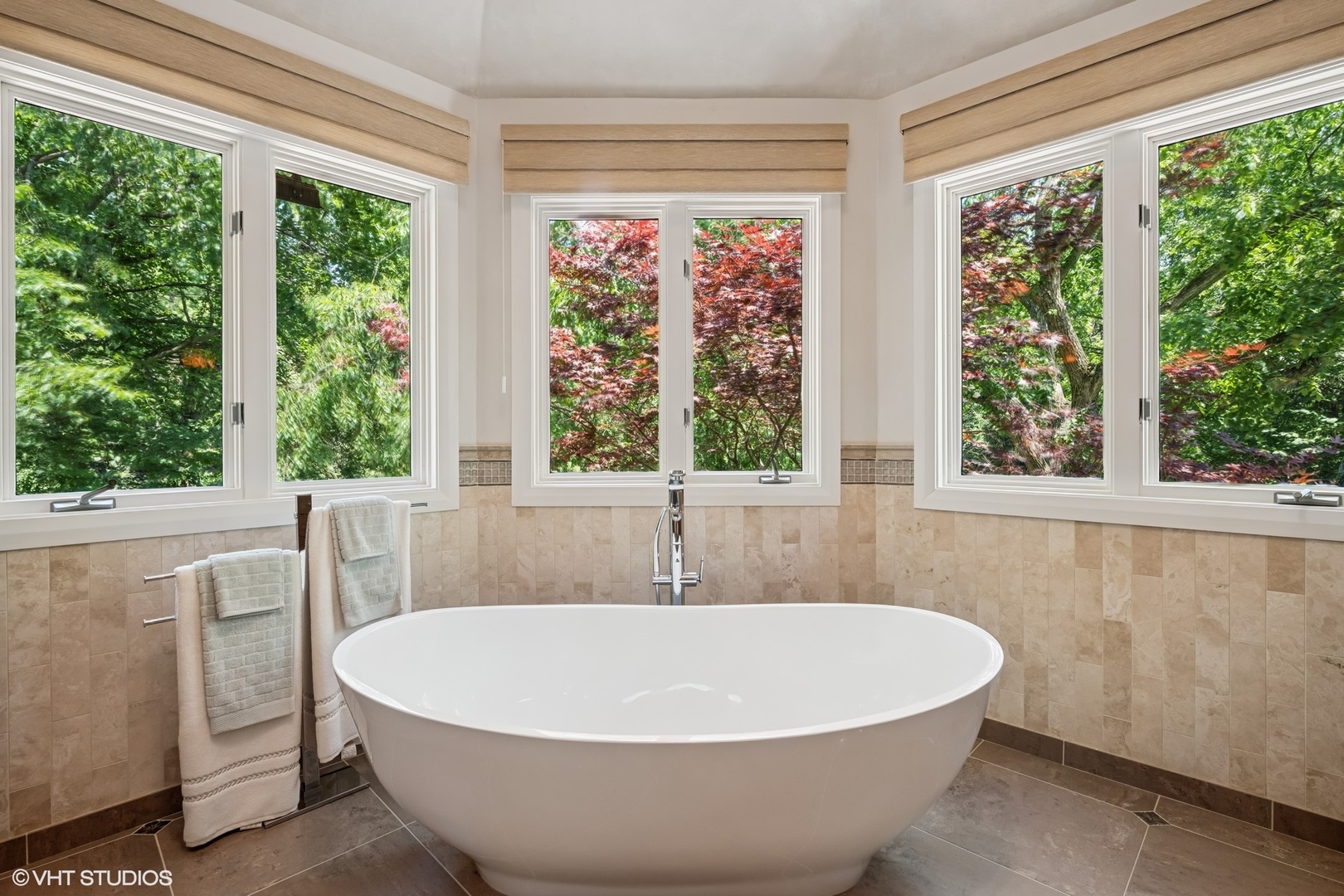 85 Ela Road Inverness, IL 60067 - Photo 39 of 89 a white bath tub sitting in a bathroom next to a window