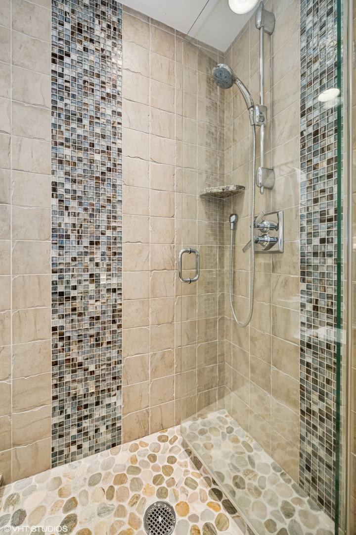 85 Ela Road Inverness, IL 60067 - Photo 51 of 89 a bathroom with a shower and a sink