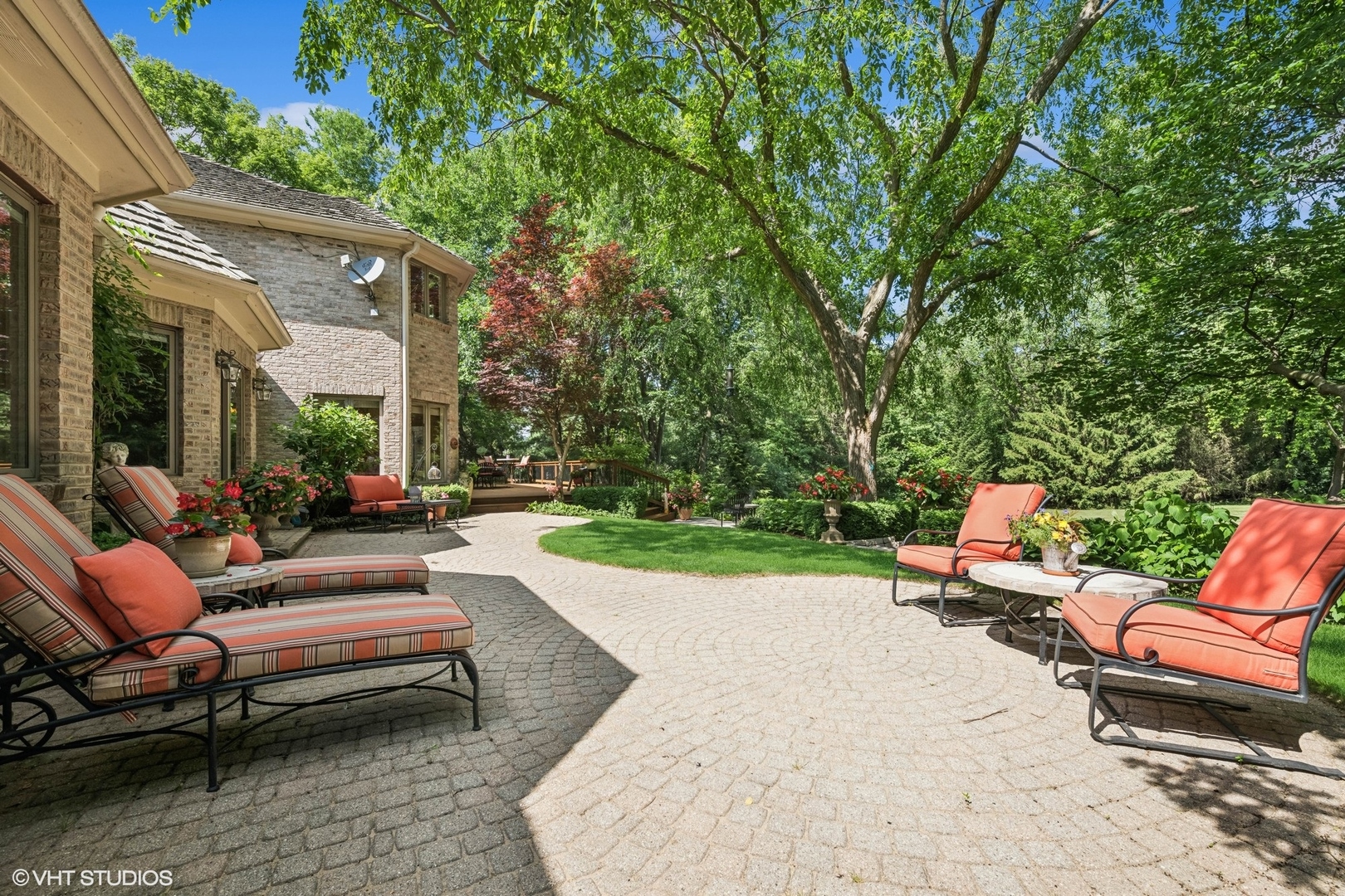 85 Ela Road Inverness, IL 60067 - Photo 68 of 89 a view of a patio with couches table and chairs with wooden fence and floor