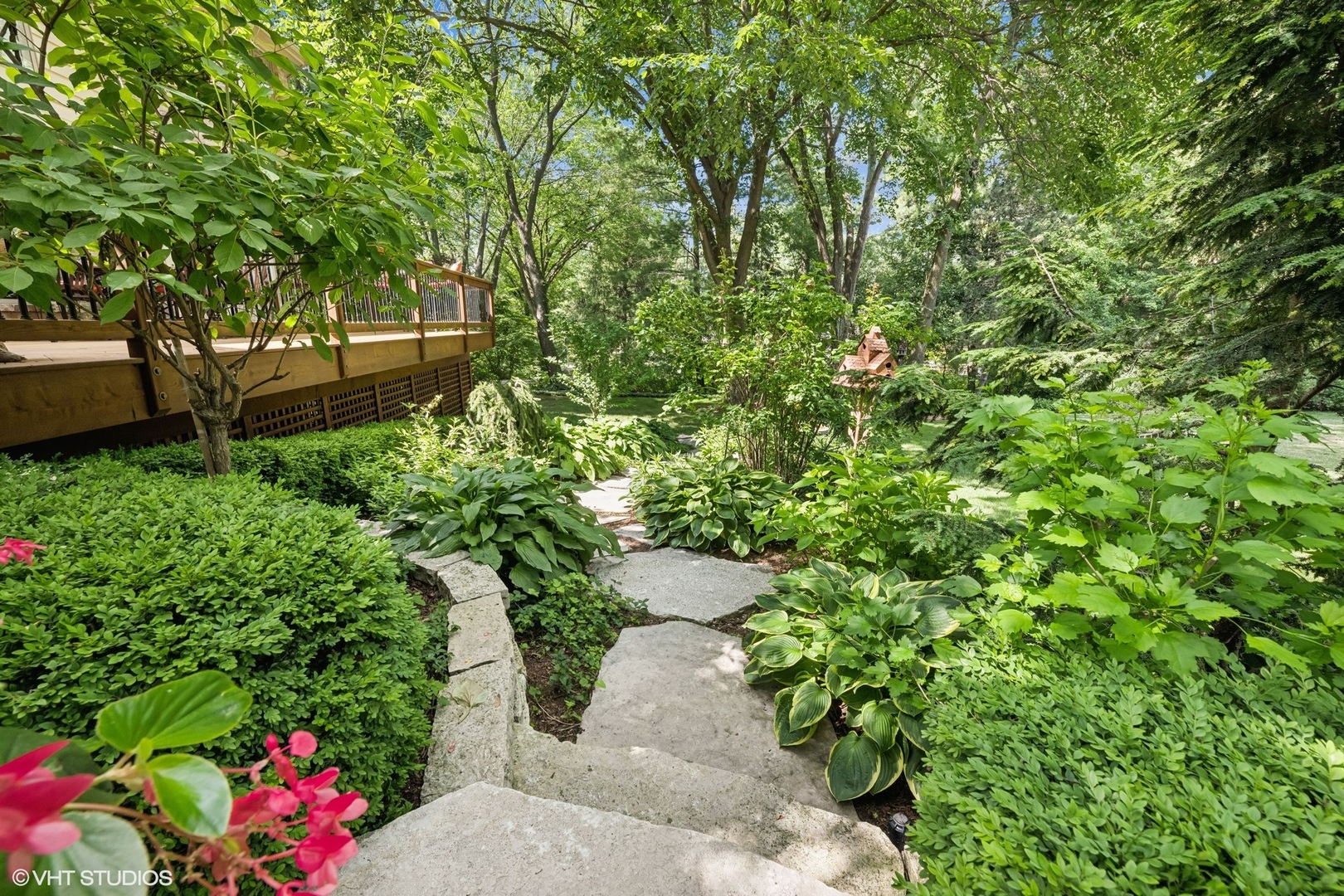 85 Ela Road Inverness, IL 60067 - Photo 75 of 89 a view of a garden with plants and large trees