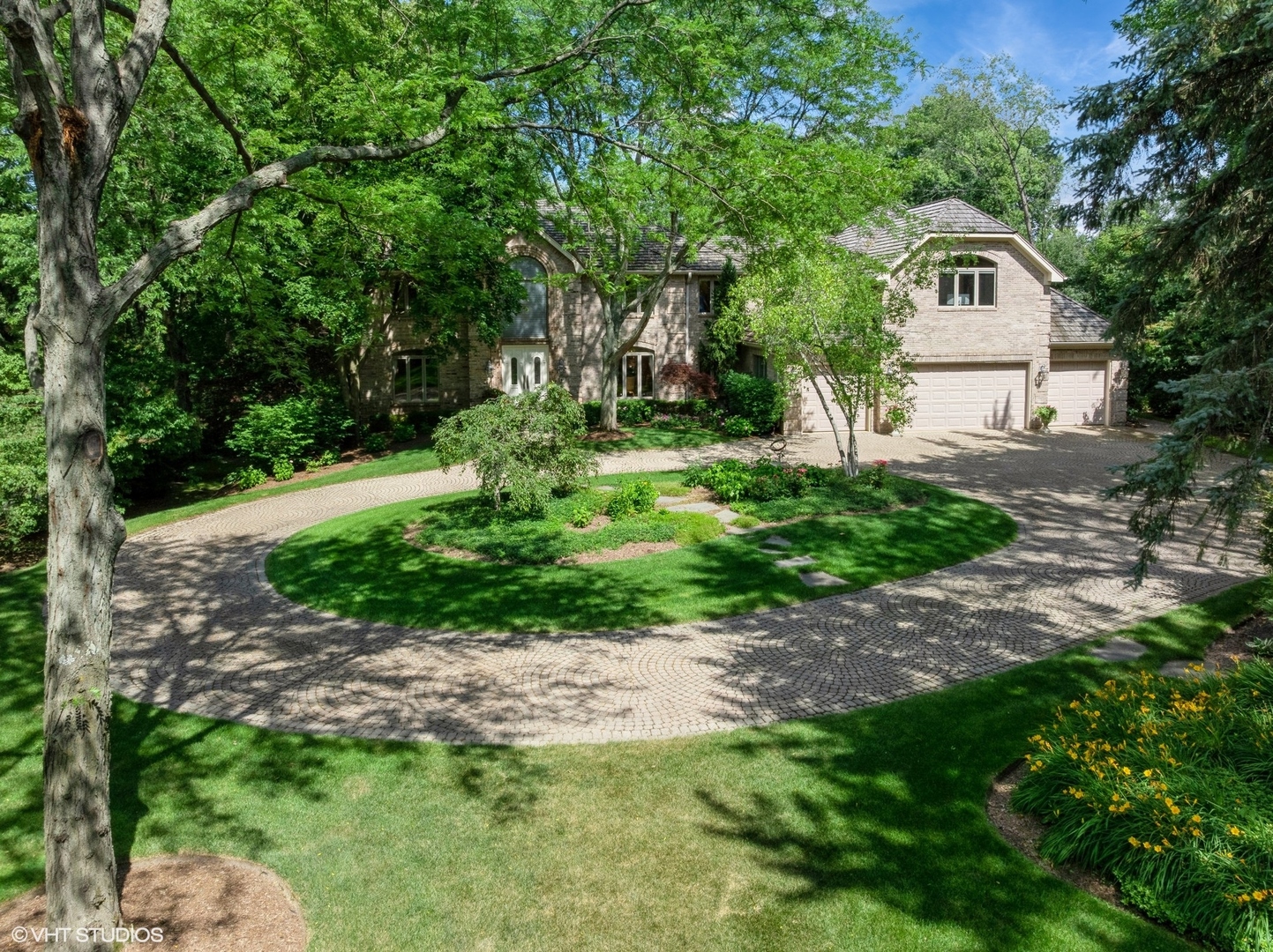 85 Ela Road Inverness, IL 60067 - Photo 81 of 89 a front view of a house with a yard and trees