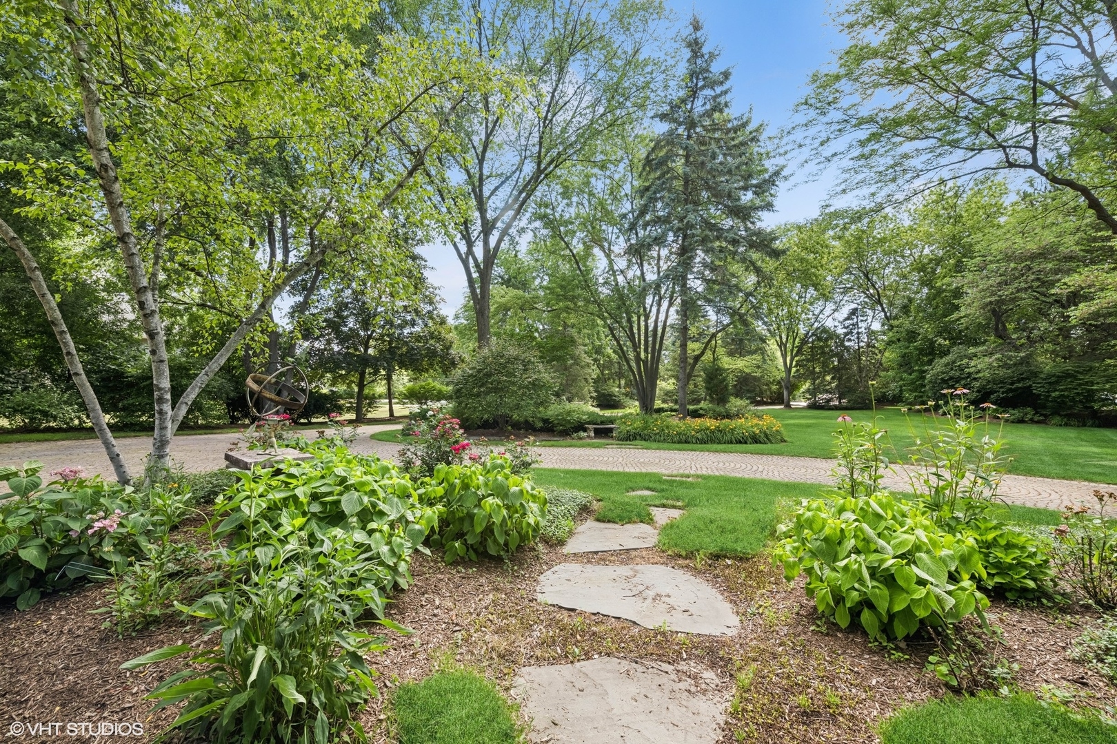 85 Ela Road Inverness, IL 60067 - Photo 82 of 89 a view of a garden with lawn chairs