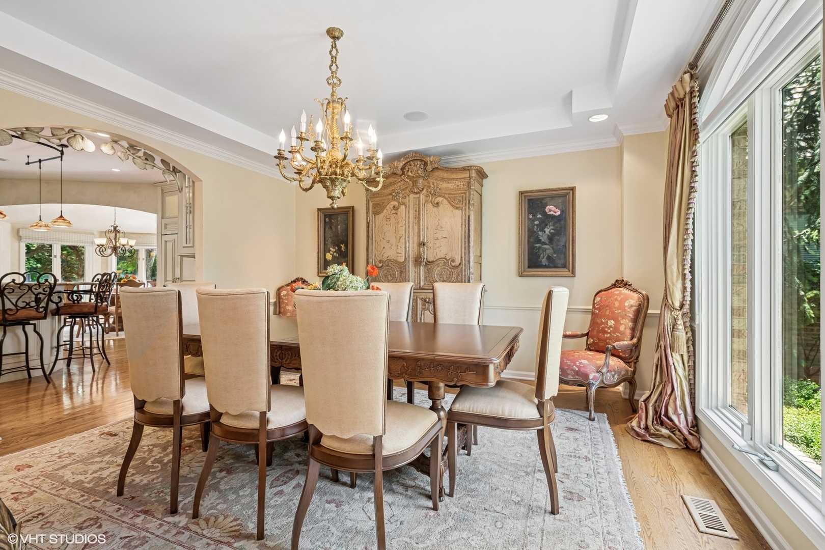 85 Ela Road Inverness, IL 60067 - Photo 9 of 89 a dining room with furniture a chandelier and wooden floor