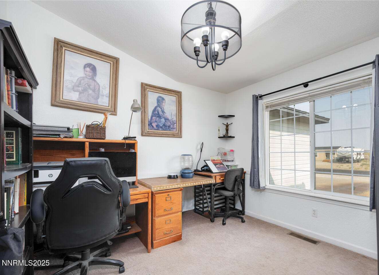 5655 Dillon Drive Fallon, NV 89406 - Photo 8 of 25 a view of a workspace with furniture and a window