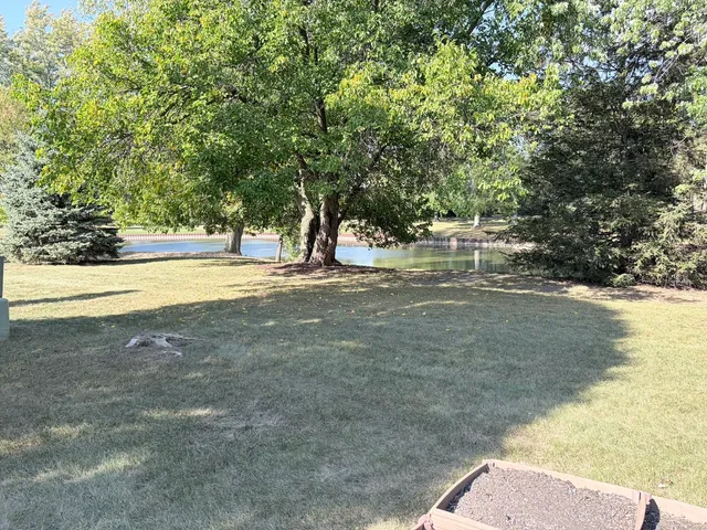 a view of ocean view with large trees