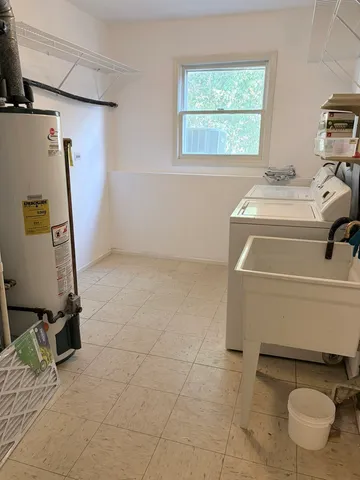 a bathroom with a sink and a toilet