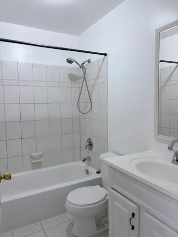 a bathroom with a sink a toilet and a bathtub