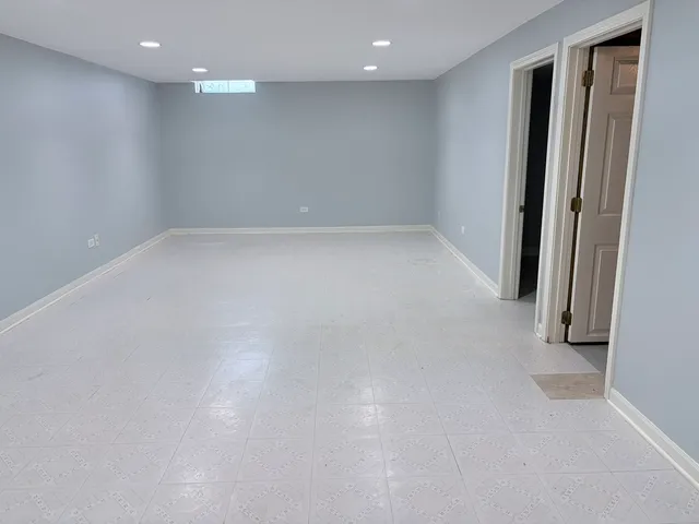 an empty room with a natural light