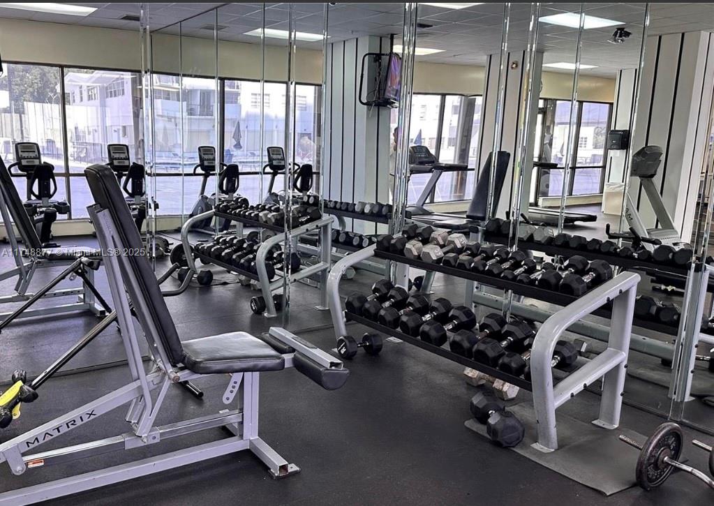 2750 Northeast 183rd Street, Unit 801 Aventura, FL 33160 - Photo 21 of 29 a view of a room with gym equipment