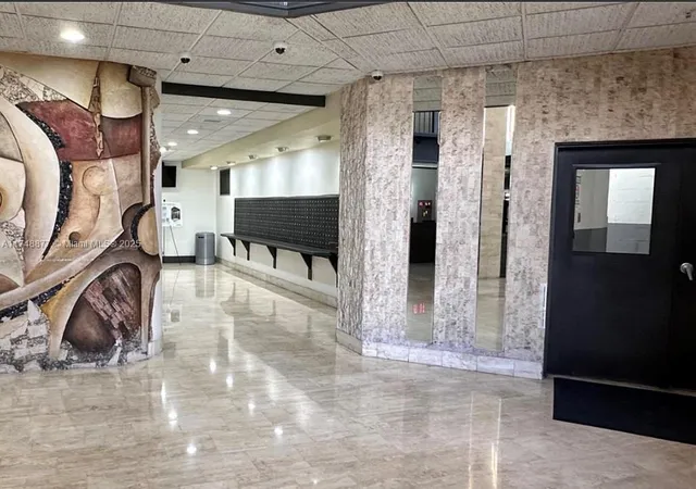 a view of a lobby with furniture and a livingroom