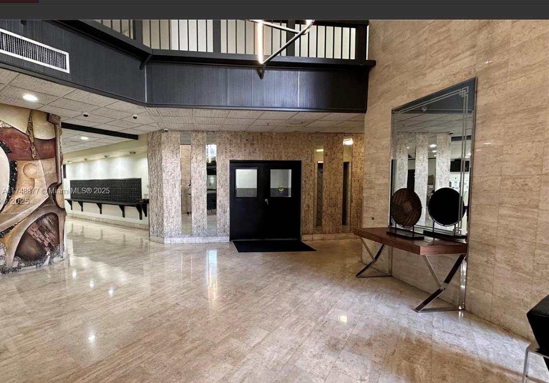 2750 Northeast 183rd Street, Unit 801 Aventura, FL 33160 - Photo 28 of 29 a view of a lobby with furniture and a livingroom