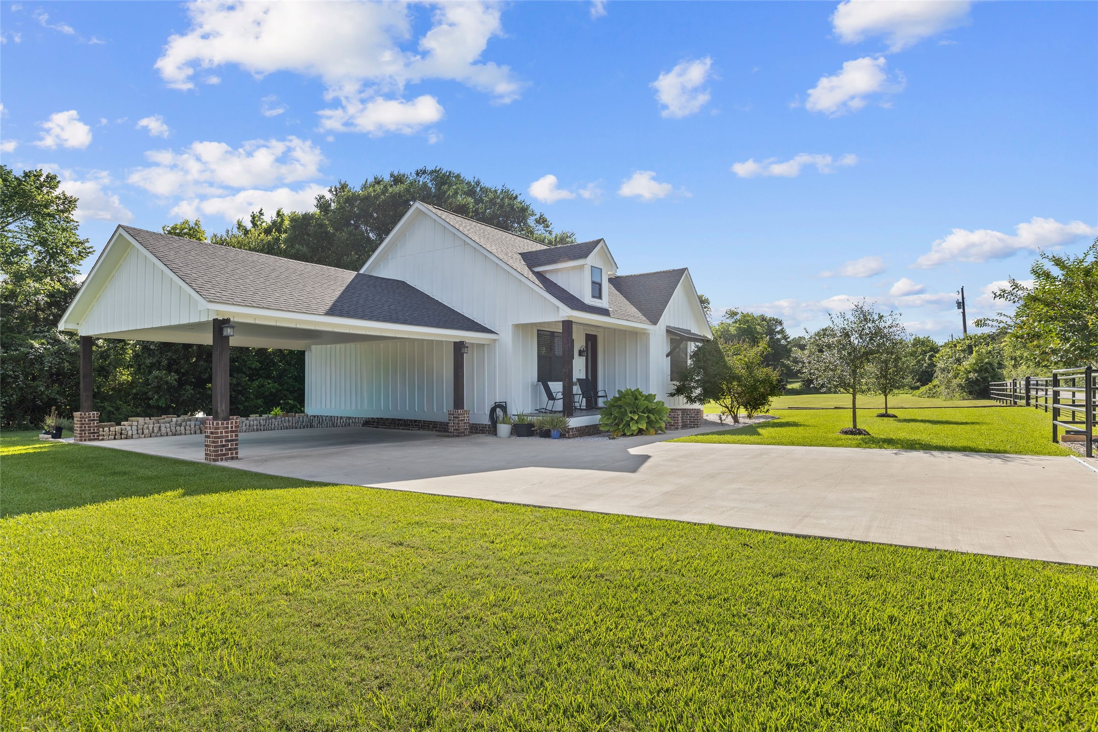 2021 Strangmeier Road Brenham, TX 77833 - Photo 3 of 16 Crisp board-and-batten exterior creates a timeless feel.
