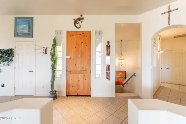 a view of bathroom with tub and shower