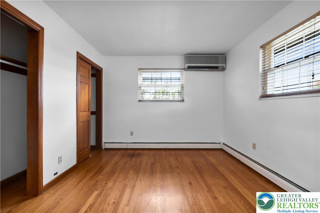 2118 6th Street Bethlehem, PA 18020 - Photo 13 of 40 a view of empty room with wooden floor and fan