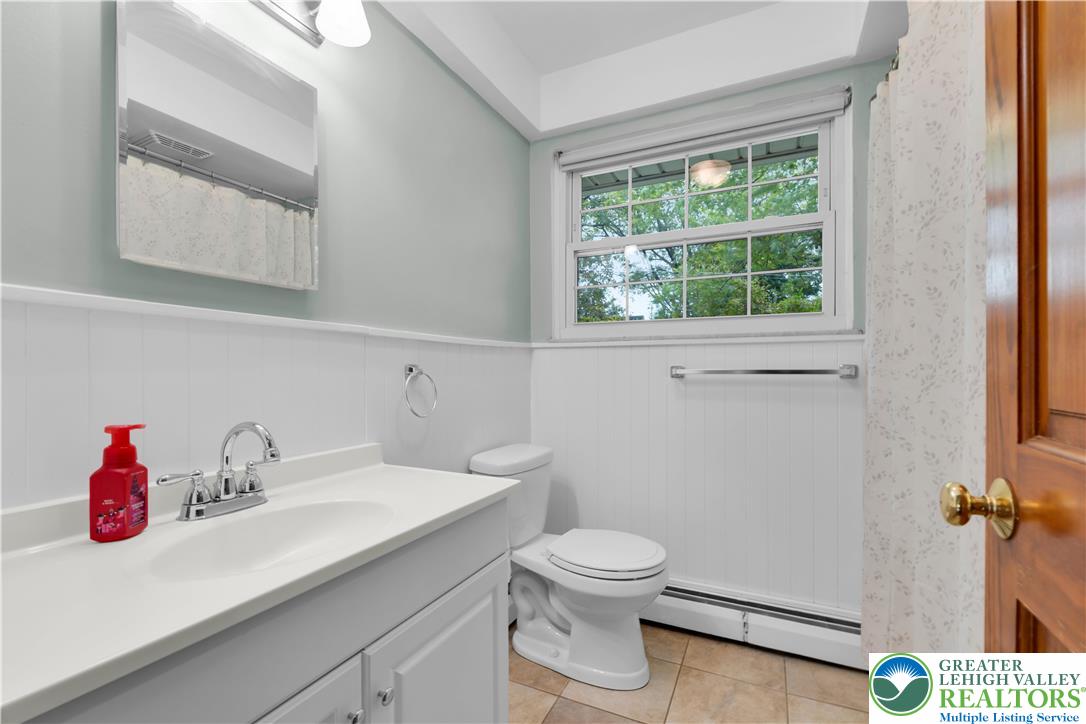 2118 6th Street Bethlehem, PA 18020 - Photo 18 of 40 a bathroom with a sink and a toilet