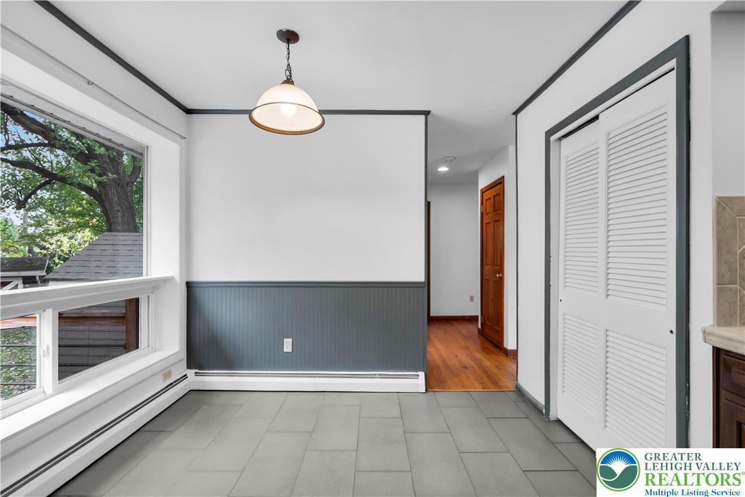 2118 6th Street Bethlehem, PA 18020 - Photo 9 of 40 a view of an empty room with wooden floor and a window