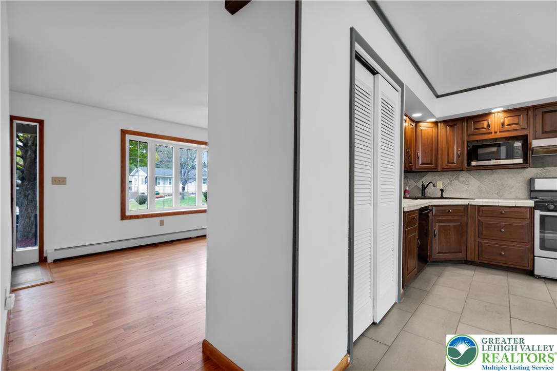2118 6th Street Bethlehem, PA 18020 - Photo 10 of 40 a view of a kitchen with a sink dishwasher and a refrigerator