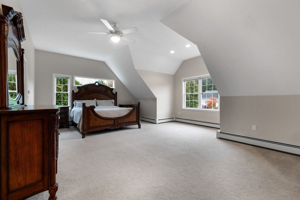731 Samuel Drive Northbridge, MA 01588 - Photo 17 of 33 a living room with furniture and a large window