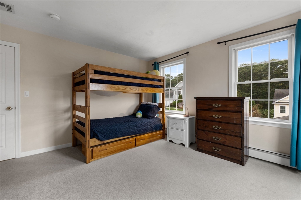 731 Samuel Drive Northbridge, MA 01588 - Photo 24 of 33 a bedroom with a closet and a window