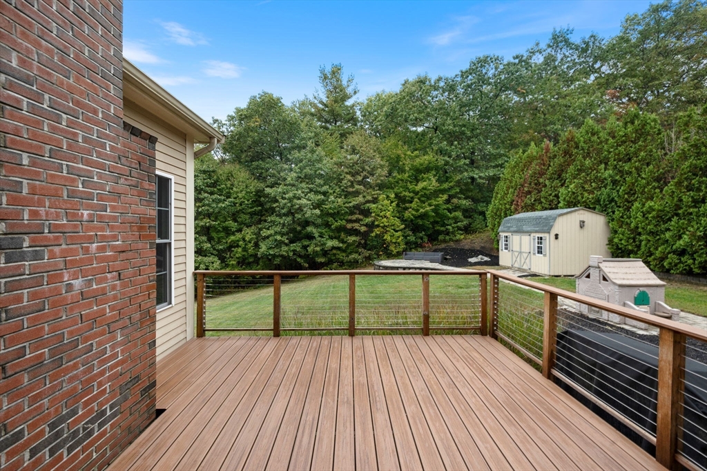 731 Samuel Drive Northbridge, MA 01588 - Photo 28 of 33 a view of a balcony with wooden floor and fence