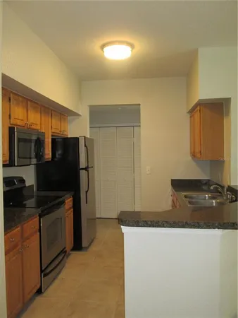 $1,650 | 5957 Westgate Drive, Unit 1912, Orlando, FL 32835