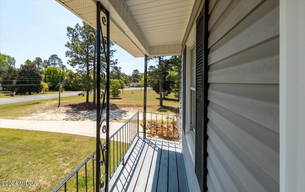3645 Tidwell Road Lizella, GA 31052 - Photo 19 of 26 a view of a balcony with lake view and a ocean view