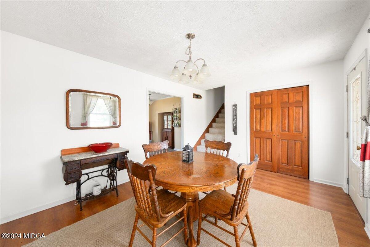3645 Tidwell Road Lizella, GA 31052 - Photo 10 of 26 a dining room with furniture and window