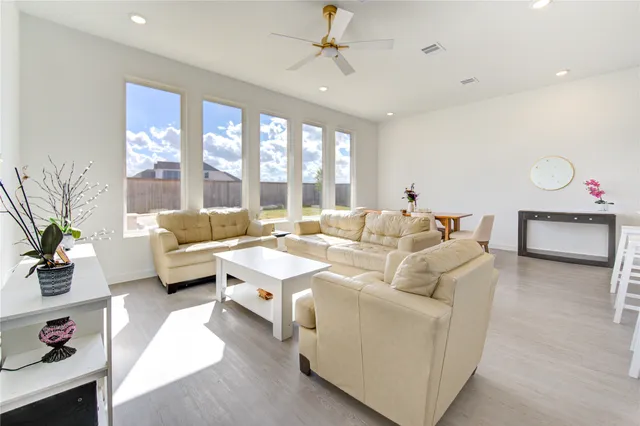 a bedroom with furniture and a bed