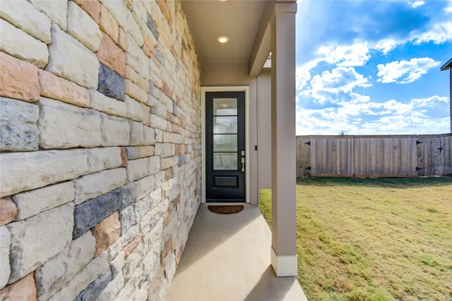 a front view of a house with yard