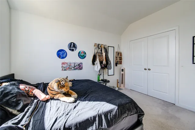 a view of a dining room with furniture and window