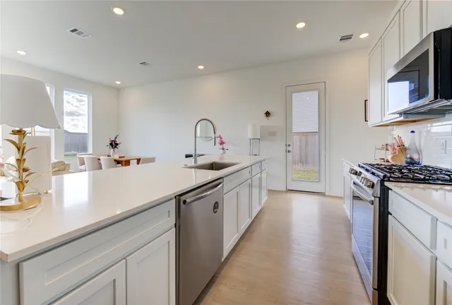 a house view with a garden space