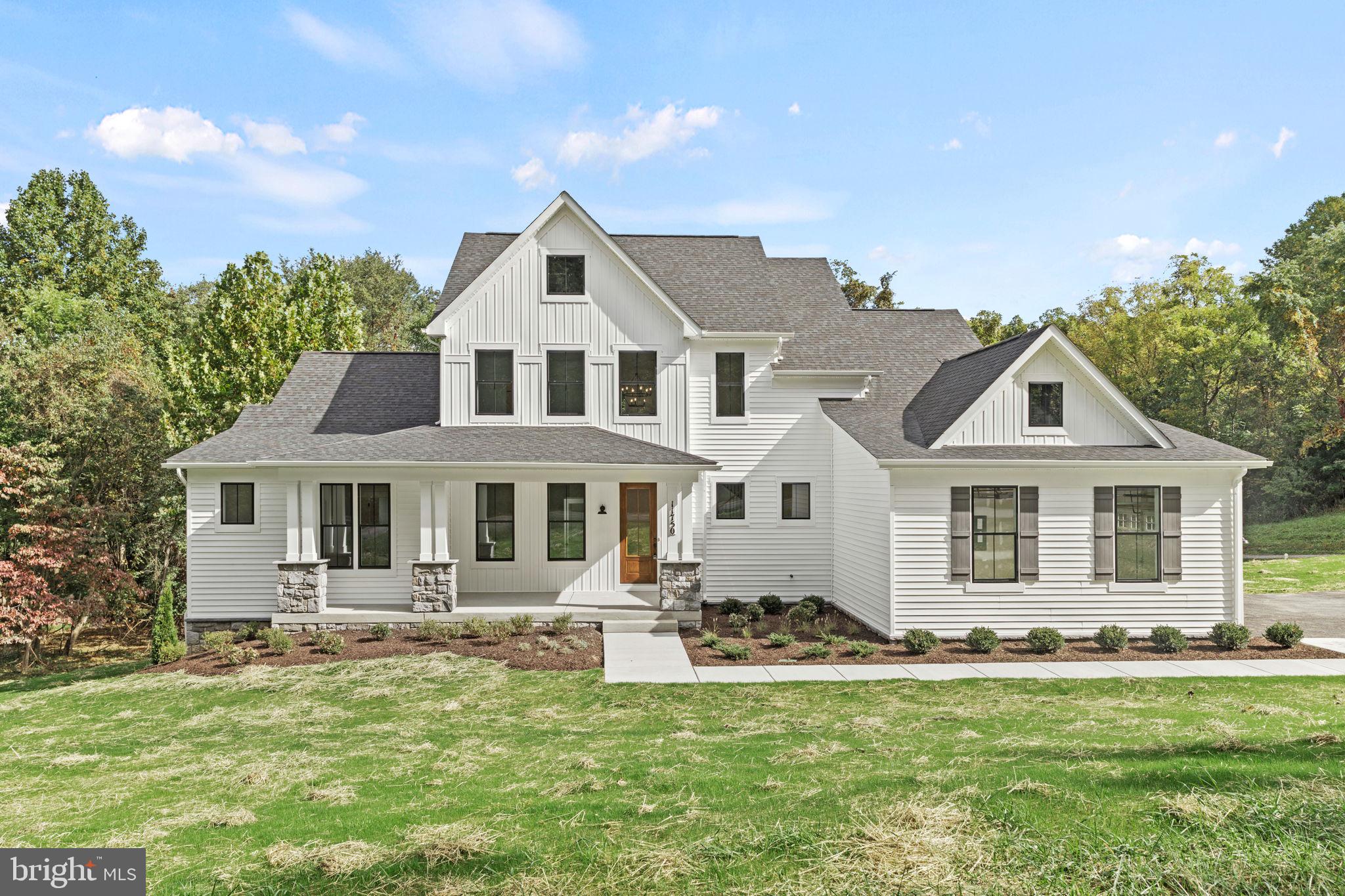 640 Grim Road Stephens City, VA 22655 - Photo 1 of 50 a front view of a house with a garden and yard
